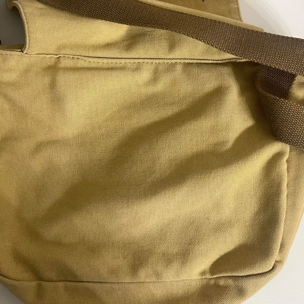 Tan canvas satchel messenger bag with adjustable strap